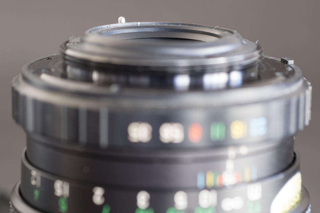 Fujinon lens - the aperture ring is designed with a small tab which transmits the aperture pre-selected by the photographer to a rotating ring on the camera's body.